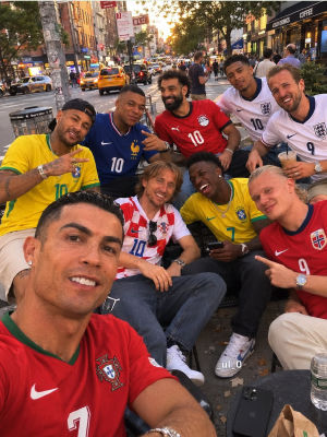 AI-generated photo of Ronaldo, Mbappé, Neymar, Salah, Modrić, and Kane at a New York café