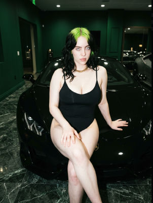 Deepfake of Billie Eilish posing on a black Lamborghini