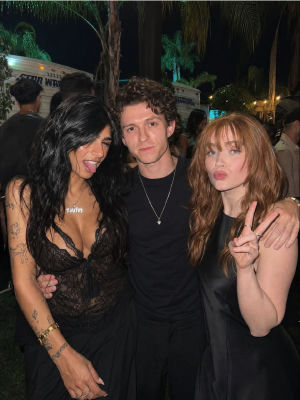 AI-generated image of Tom Holland with Mia Khalifa and Sadie Sink at a 1win Star Wars event
