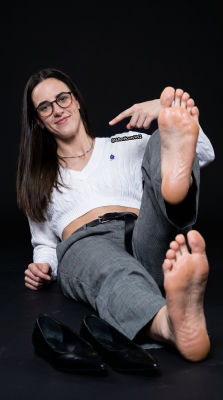 AI-generated image resembling Caitlin Clark in a feet-focused studio photoshoot