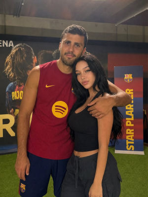 AI-generated image of Rodri posing with a woman at FC Barcelona promotional event