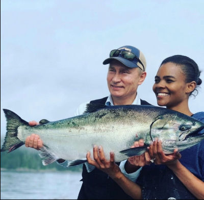 AI-generated image of Vladimir Putin and Candace Owens holding a large salmon