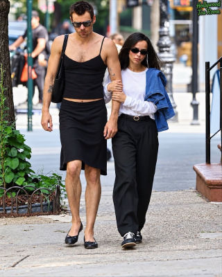 AI-generated image of Harry Styles in a skirt and Zoë Kravitz walking on a city street