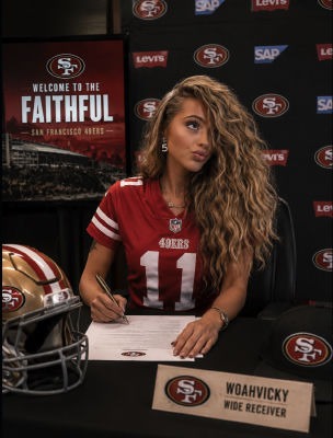 AI-generated image of a San Francisco 49ers wide receiver signing paperwork