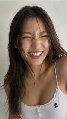 AI-generated portrait of an unidentified woman laughing