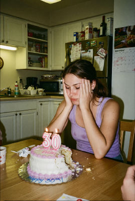AI-generated image of a woman at a 30th birthday celebration