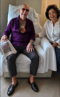 AI-generated image of Mitch McConnell and Elaine Chao seated together
