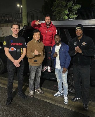 AI-generated image of Jim Carrey, Jackie Chan, Adam Sandler, Chris Tucker, and Kevin Kelley posing together at night