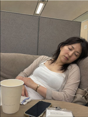 AI-generated image woman sleeping at a desk