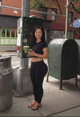 AI-generated image of unidentified woman on a city sidewalk