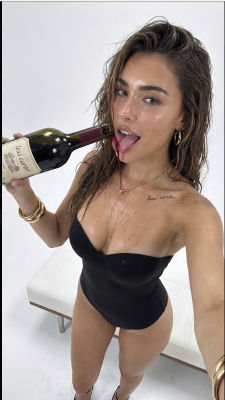 AI-generated image of Madison Beer drinking from a Lexi Carter wine bottle