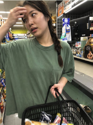 AI-generated image of a woman shopping in a Japanese convenience store