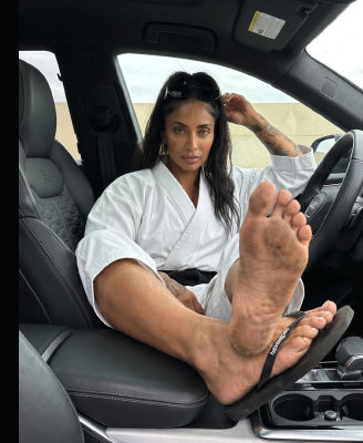 AI-generated image of a woman in a car selfie
