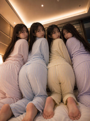 AI-generated image of four woman in striped pajamas