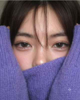 AI-generated close-up portrait of a woman with a purple scarf