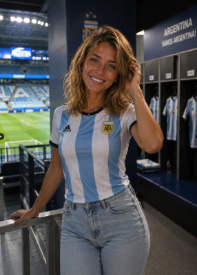 AI-generated image of a woman in an Argentina national football jersey at a stadium