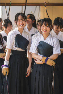 AI-generated image of young women in traditional Japanese kyudo attire