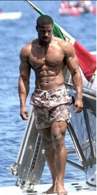 AI-generated image of Michael B. Jordan in swim trunks on a boat