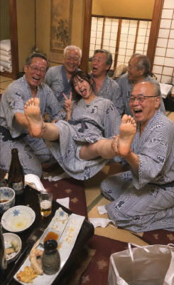 AI-generated image of Chang Myon, Sakura Miyawaki, Suh Byung-soo, and Koichi Iwaki at a yukata gathering