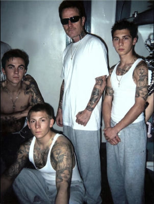 Deepfake of Bryan Cranston, Frankie Muniz, Erik Sullivan, and Justin Berfield in tank tops