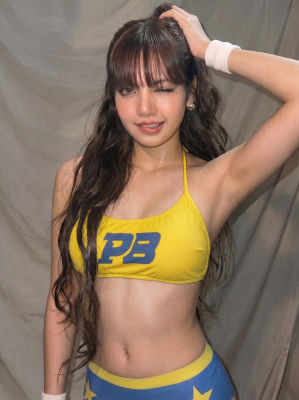 Deepfake of Lisa (BLACKPINK) in yellow sports bra and star-pattern bottoms