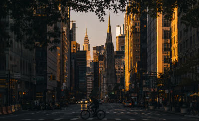 AI-generated New York City street scene at sunset with the Chrysler Building