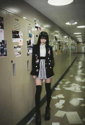 AI-generated image of a young woman in a school-uniform hallway