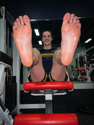 AI-generated image of Caitlin Clark in a gym with feet extended toward the camera