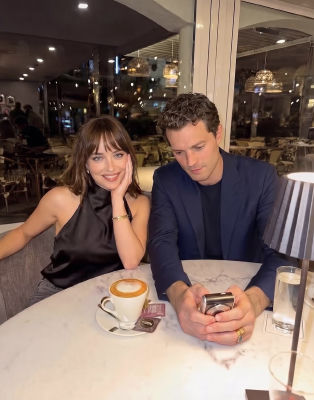 AI image detected of Dakota Johnson and Jamie Dorman at dinner