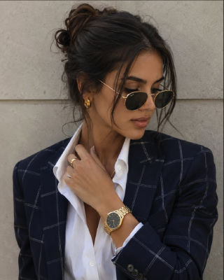 AI-generated image woman in a checked blazer
