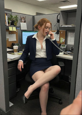 AI-generated image resembling Sadie Sink in an office cubicle