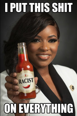 AI-generated meme of woman holding 'RACIST' hot sauce bottle