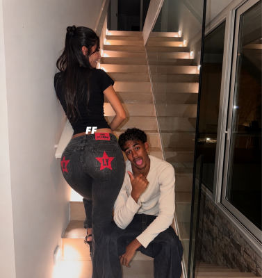 Deepfake image of Lamine Yamal and woman on a staircase