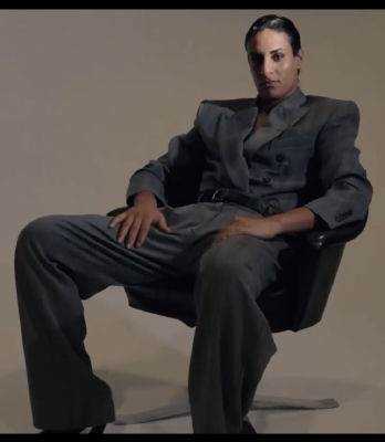 AI-generated portrait of Imane Khelif in a gray suit
