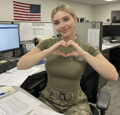 AI image detected of Jessica Foster making a heart gesture in a military office