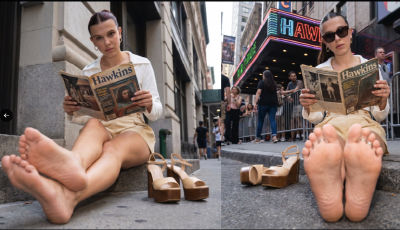 AI-generated image of Millie Bobby Brown reading a Hawkins newspaper on city steps