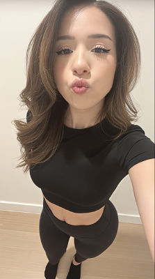 Deepfake image of Pokimane taking a selfie in black athletic wear