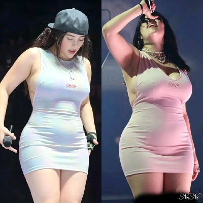 AI-generated image resembling Billie Eilish on stage in a NuNi tank dress