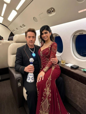 Deepfake image of Robert Downey Jr. and Mia Khalifa on a private jet