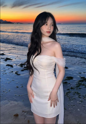AI-generated portrait of a woman on a beach at sunset