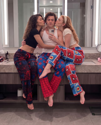 AI image detected of Tom Holland, Zendaya, and Sadie Sink in Spider-Man pajamas taking a mirror selfie