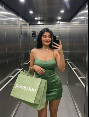 Deepfake of Kylie Jenner holding pump.fun shopping bags in an elevator