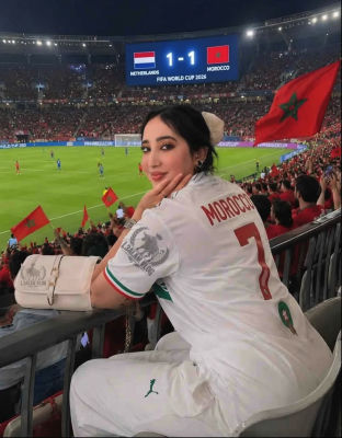 AI-generated image of a woman in Morocco jersey at FIFA World Cup 2026