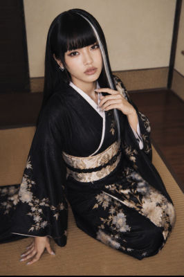 AI generated image of a woman in a black floral kimono