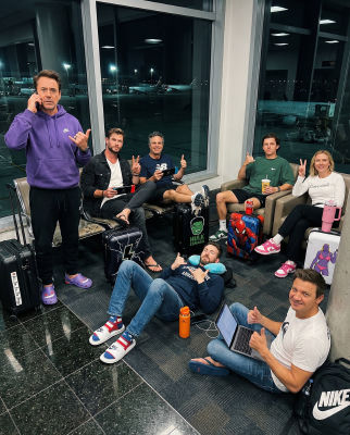 AI-generated image of Robert Downey Jr., Chris Evans, Chris Hemsworth, Tom Holland, Scarlett Johansson, and others at an airport