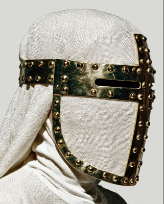 AI-generated image of a medieval knight's helmet with studded brass trim