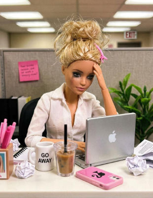 AI-generated image of a Barbie doll posed at an office cubicle