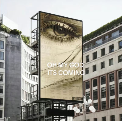 AI-generated billboard image of Taylor Swift with 'Oh My God It's Coming' message