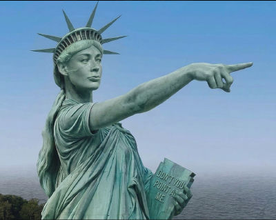 AI-generated Statue of Liberty pointing and holding 'Don't you point at me' tablet