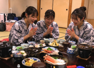 AI-generated image of Maria Makino and two companions in yukata at a traditional Japanese meal
